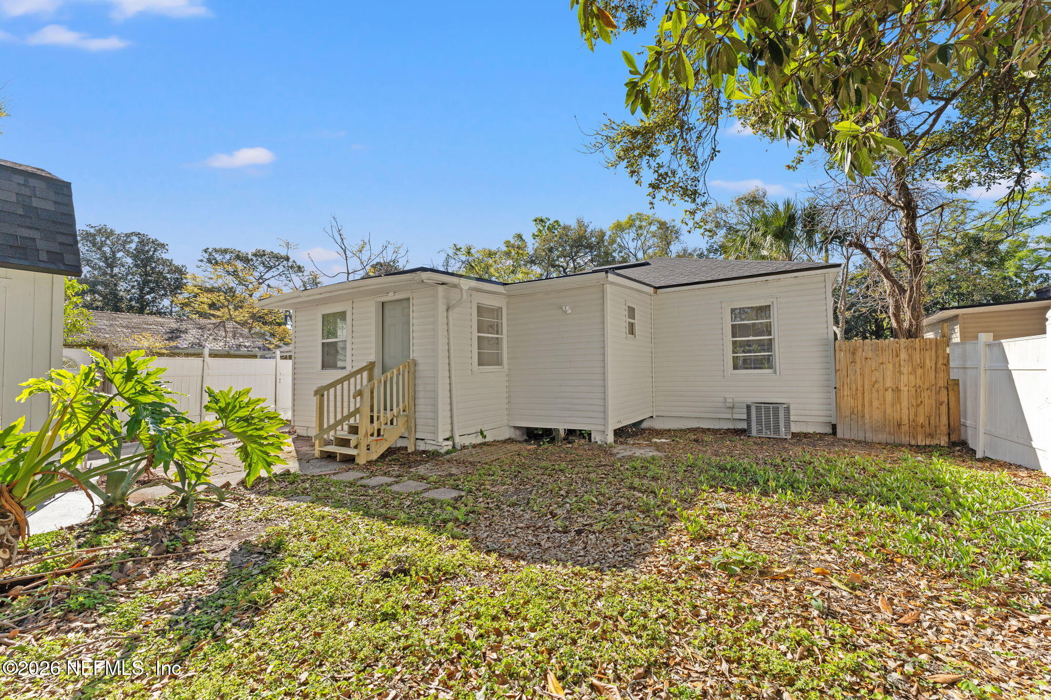 4517 Delta Avenue Jacksonville, FL 32205 - Photo 24 of 25 a backyard of a house with lots of green space