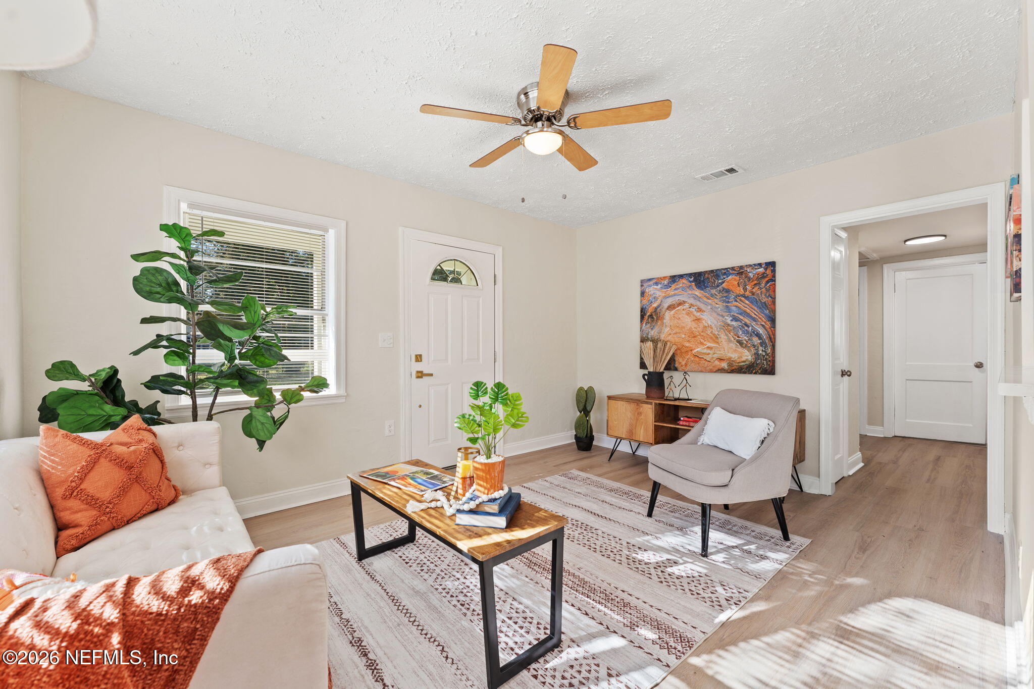 4517 Delta Avenue Jacksonville, FL 32205 - Photo 4 of 25 a living room with furniture and a window