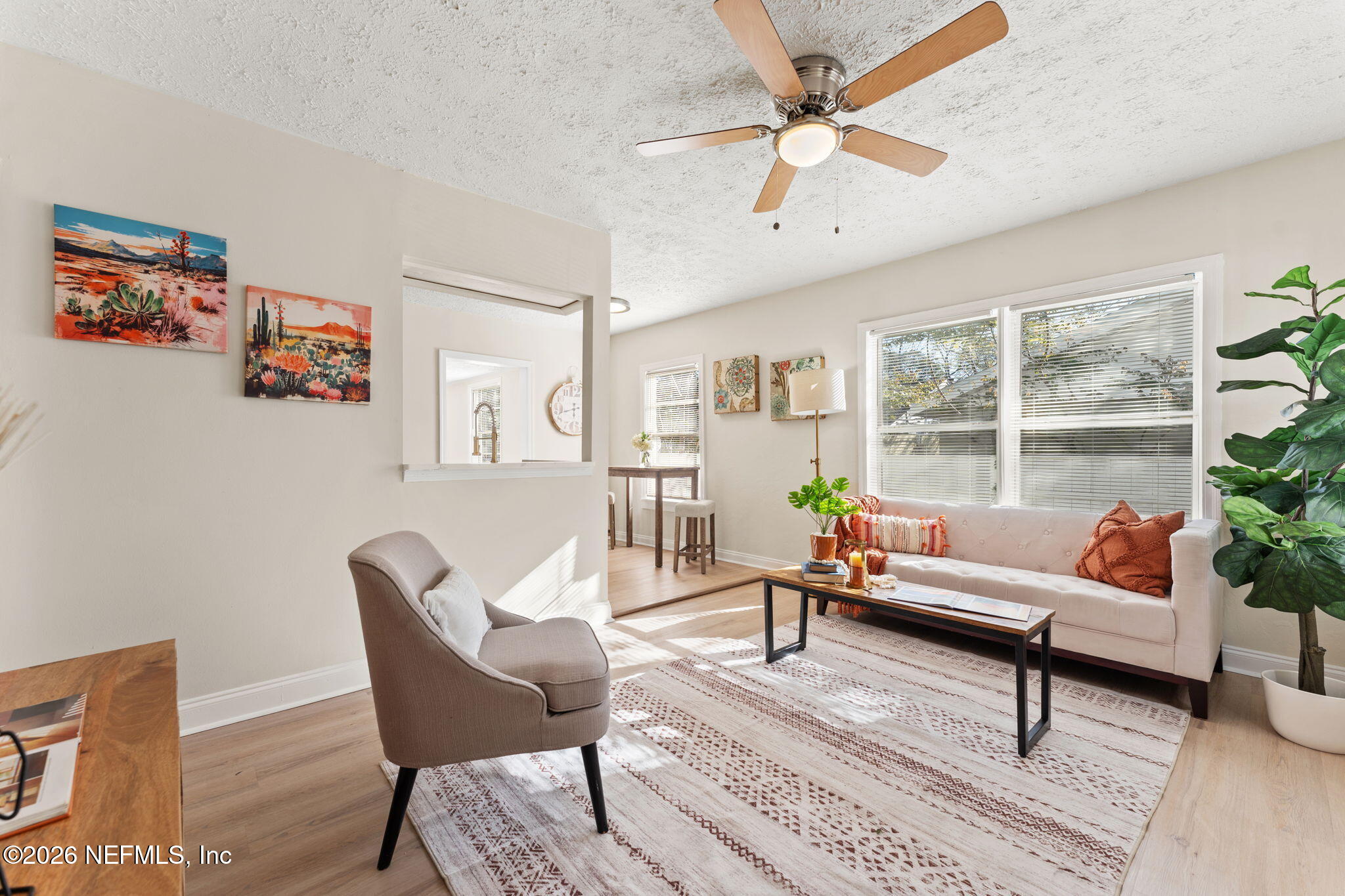 4517 Delta Avenue Jacksonville, FL 32205 - Photo 5 of 25 a living room with furniture and a large window
