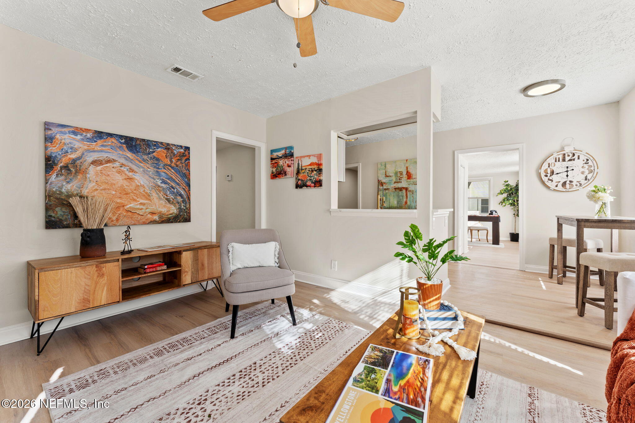 4517 Delta Avenue Jacksonville, FL 32205 - Photo 7 of 25 a living room with furniture and a flat screen tv