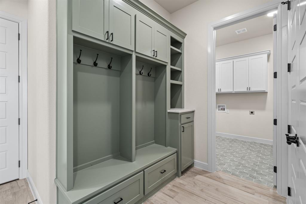 161 Frontera Drive Decatur, TX 76234 - Photo 22 of 39 Mudroom with Built-In Cabinetry, Hooks and Drawers makes for great storage