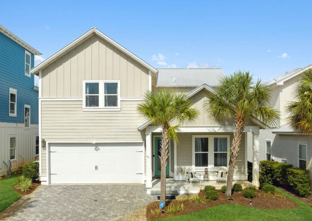 25 Lake Street Miramar Beach, FL 32550 - Photo 1 of 1 a front view of a house with a yard and garage
