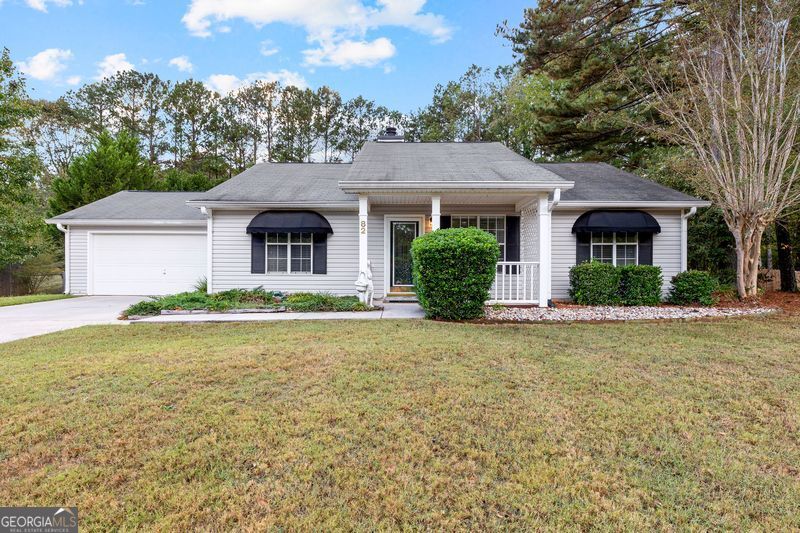 82 Spring Circle Senoia, GA 30276 - Photo 1 of 1 front view of a house with a yard