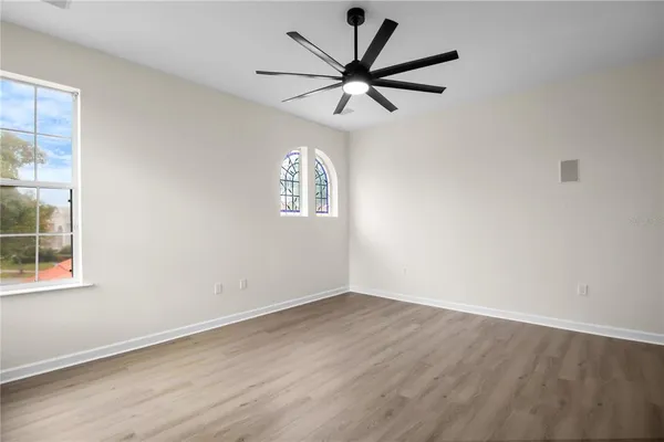 a view of swimming pool with a patio and a yard