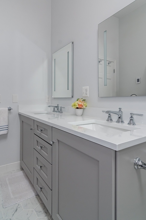 27 Appleby Road Wellesley, MA 02482 - Photo 12 of 23 a bathroom with a sink and a mirror