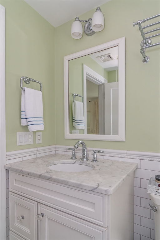 27 Appleby Road Wellesley, MA 02482 - Photo 14 of 23 a bathroom with a sink and a mirror