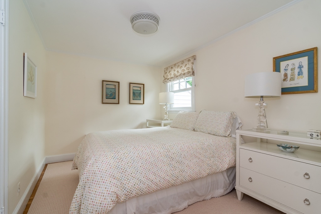 27 Appleby Road Wellesley, MA 02482 - Photo 15 of 23 a bedroom with a bed and a window