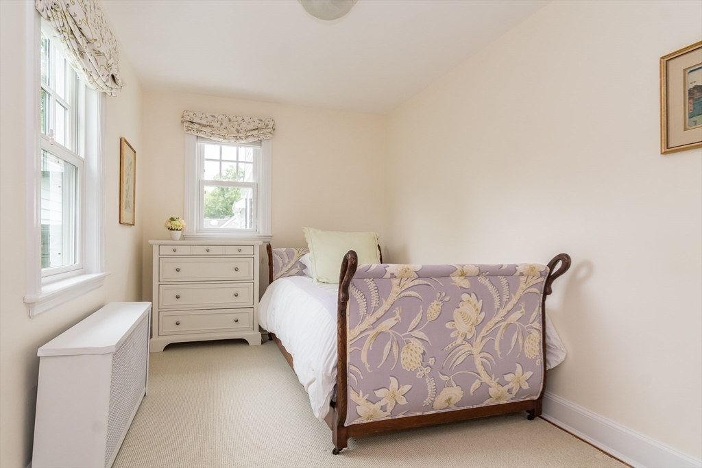 27 Appleby Road Wellesley, MA 02482 - Photo 17 of 23 a spacious bedroom with a bed and a window