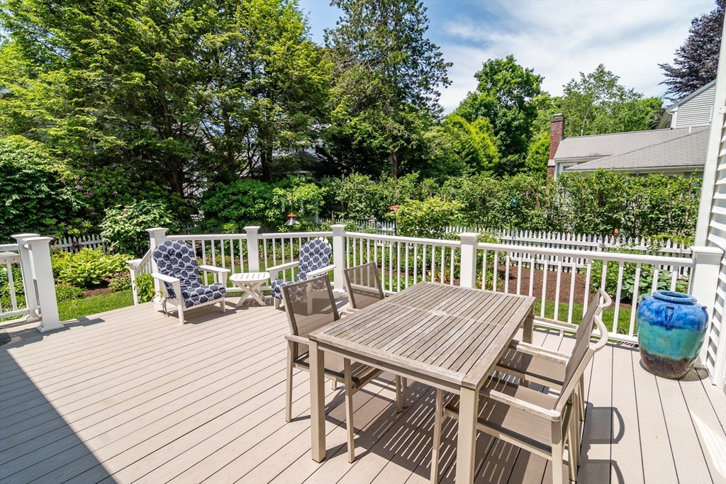 27 Appleby Road Wellesley, MA 02482 - Photo 20 of 23 a view of a table and chairs on the roof deck