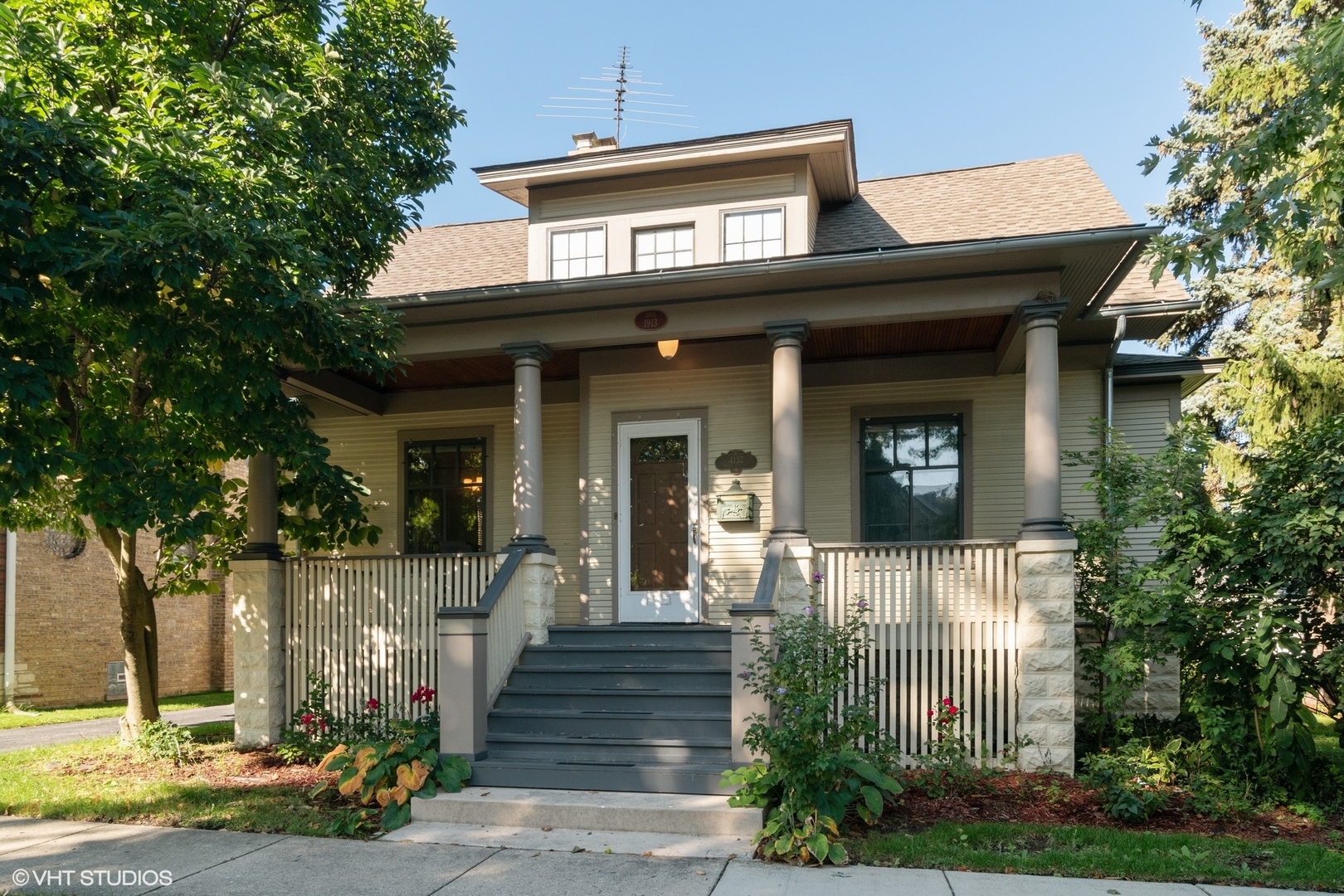 4132 Prairie Avenue Brookfield, IL 60513 - Photo 1 of 10 a front view of a house with a porch