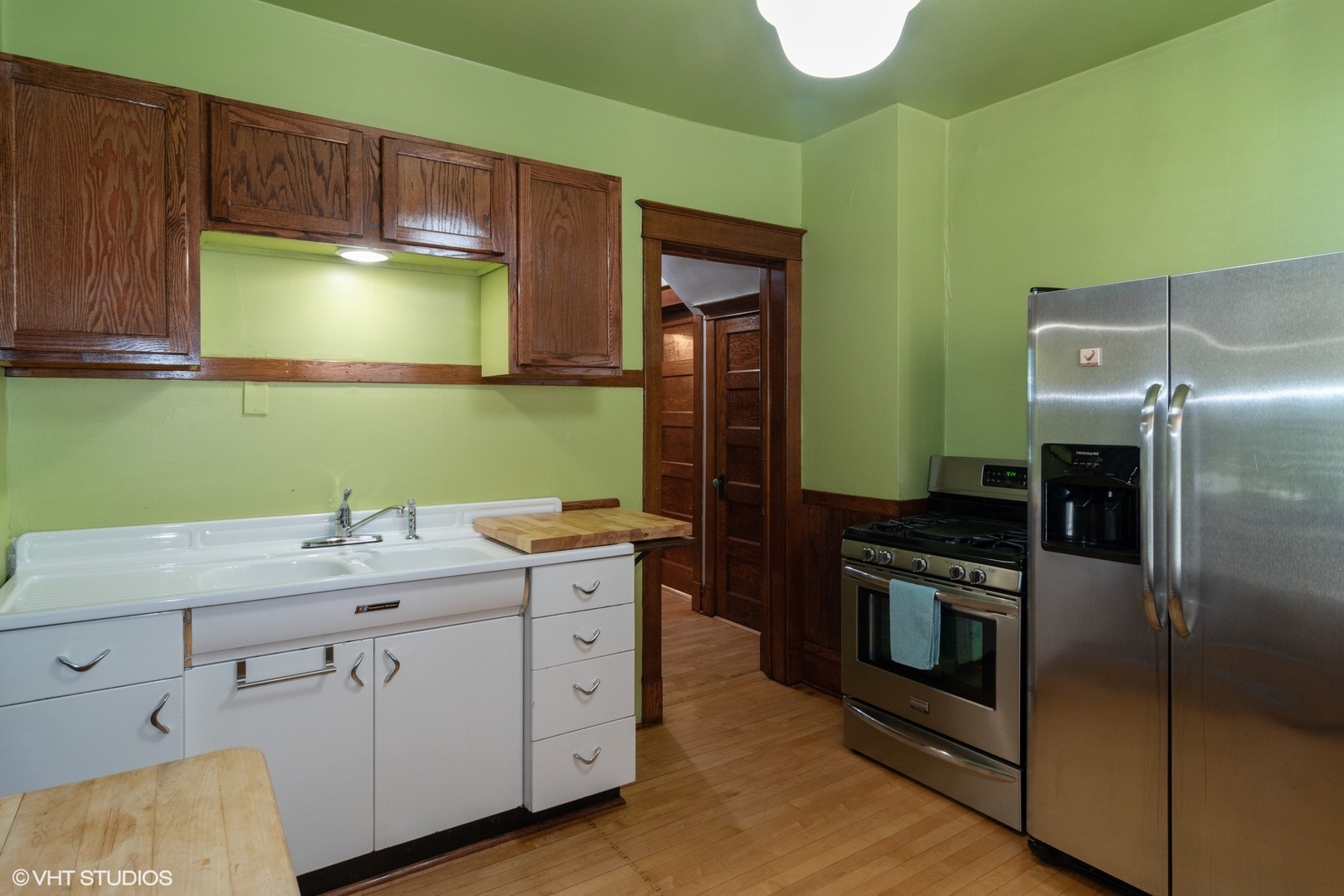4132 Prairie Avenue Brookfield, IL 60513 - Photo 4 of 10 a kitchen with a sink cabinets and stainless steel appliances