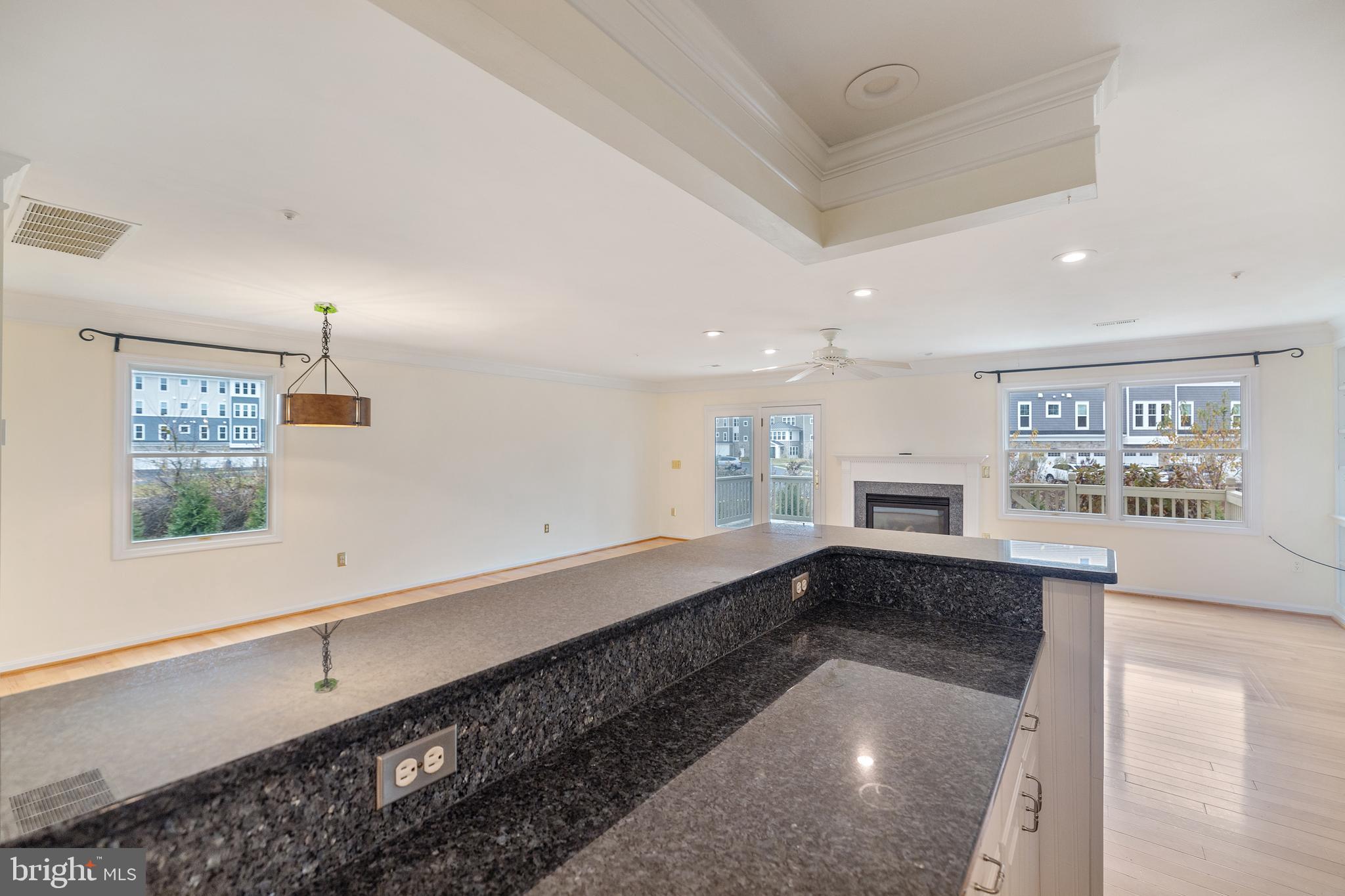 807 Auckland Way Chester, MD 21619 - Photo 16 of 47 a large white kitchen with a large window