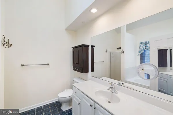 a bathroom with a white bath tub