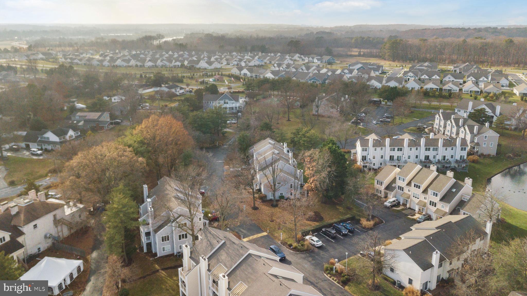 807 Auckland Way Chester, MD 21619 - Photo 38 of 47 an aerial view of a house with a lake view