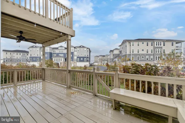 a view of a balcony with chairs