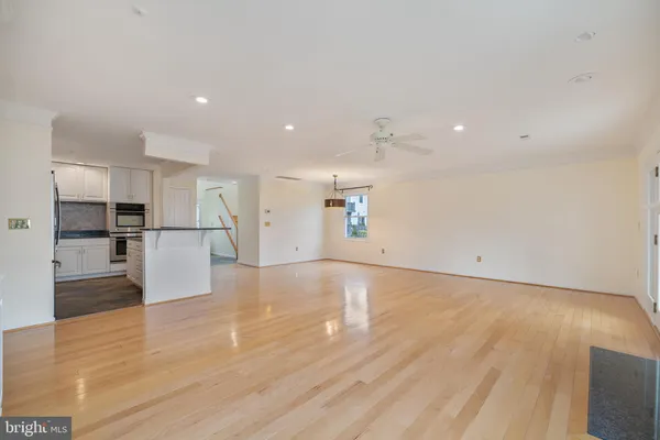 a view of a livingroom with wooden floor
