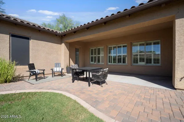 a backyard of a house with lots of green space