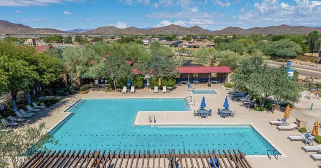 an aerial view of a house with a garden
