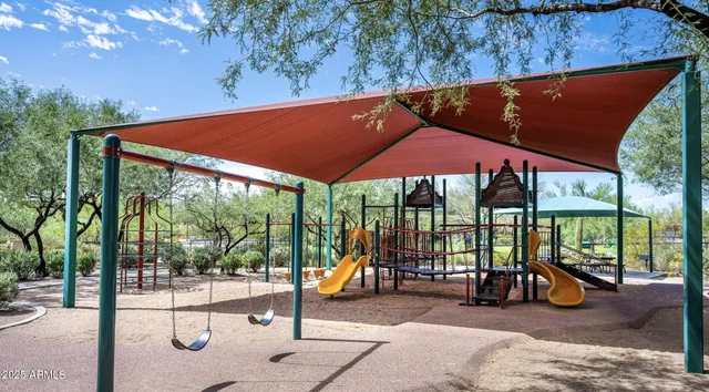 an aerial view of house with yard