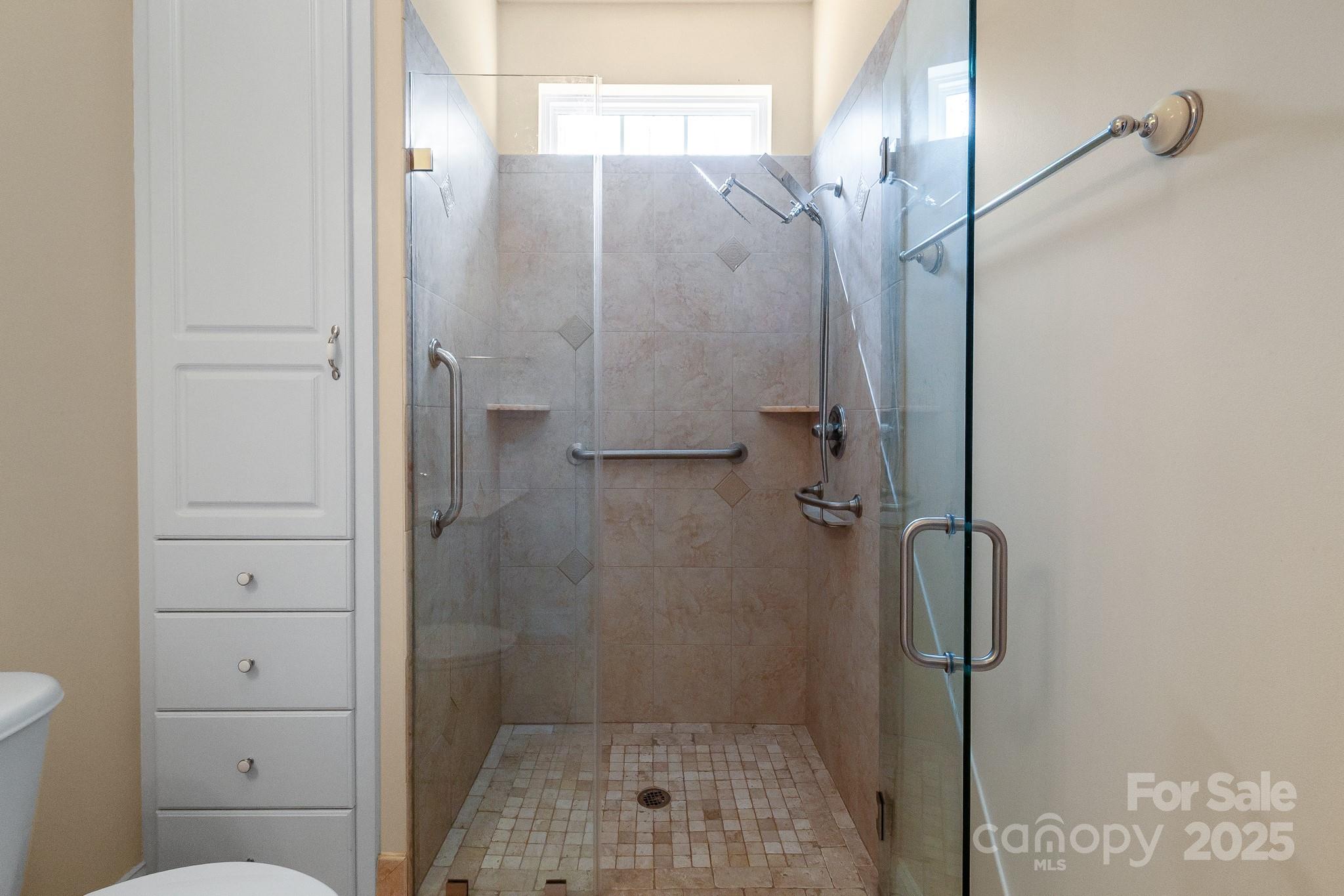 13221 Brandywine Lane Midland, NC 28107 - Photo 19 of 34 a bathroom with a shower and toilet