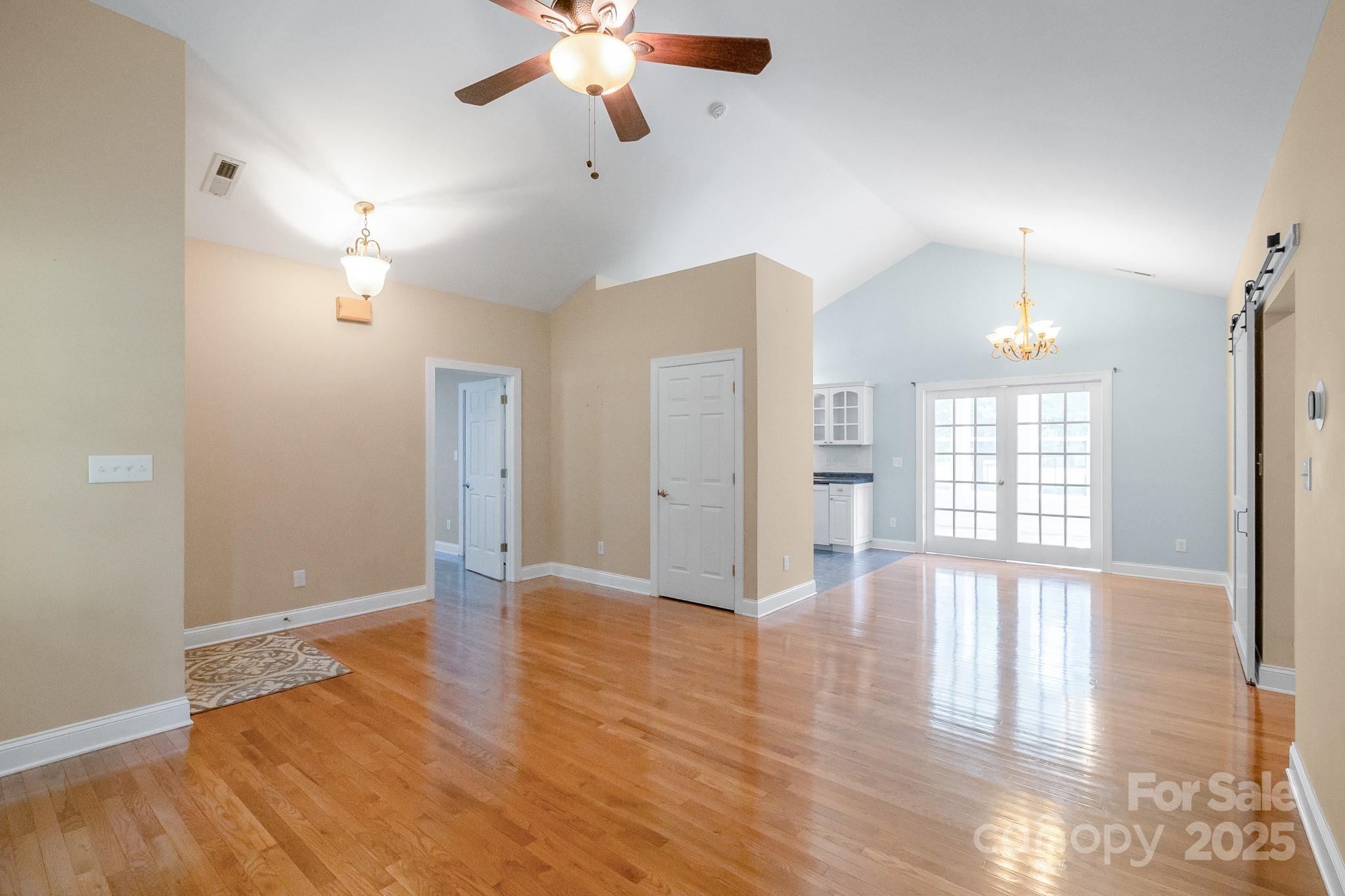 13221 Brandywine Lane Midland, NC 28107 - Photo 6 of 34 wooden floor in an empty room with a window