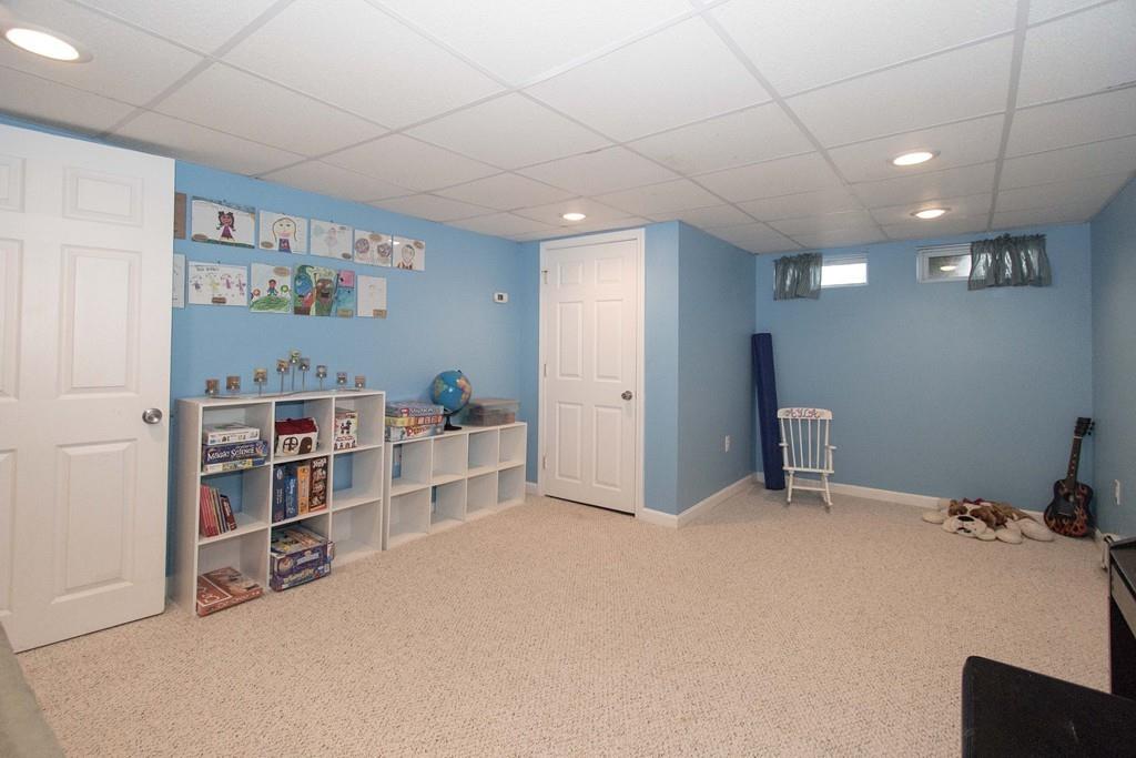 59 Warren Road Framingham, MA 01702 - Photo 12 of 25 a view of a livingroom with cabinet