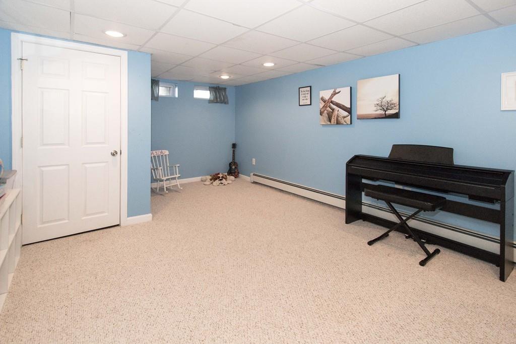 59 Warren Road Framingham, MA 01702 - Photo 13 of 25 a view of a livingroom with a workspace
