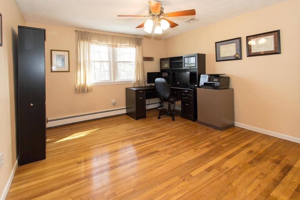 59 Warren Road Framingham, MA 01702 - Photo 19 of 25 a view of a workspace with furniture and a window