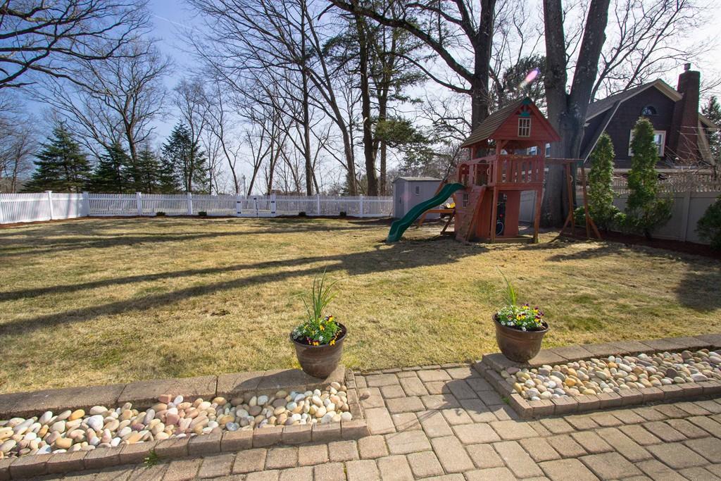 59 Warren Road Framingham, MA 01702 - Photo 23 of 25 a view of a yard with swimming pool