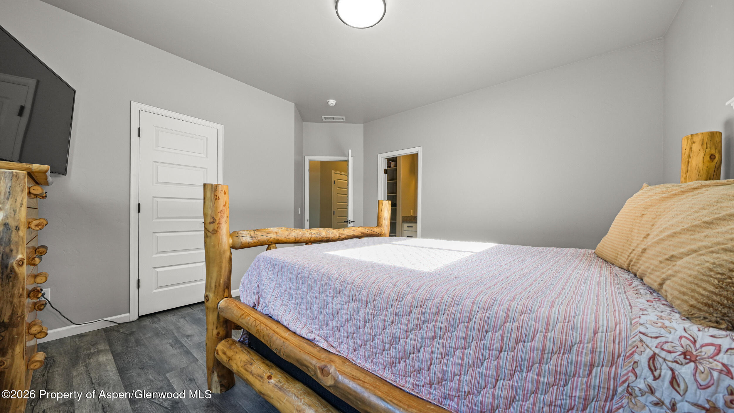 1667 Balsam Loop Rifle, CO 81650 - Photo 14 of 30 a bedroom with a bed and cabinets