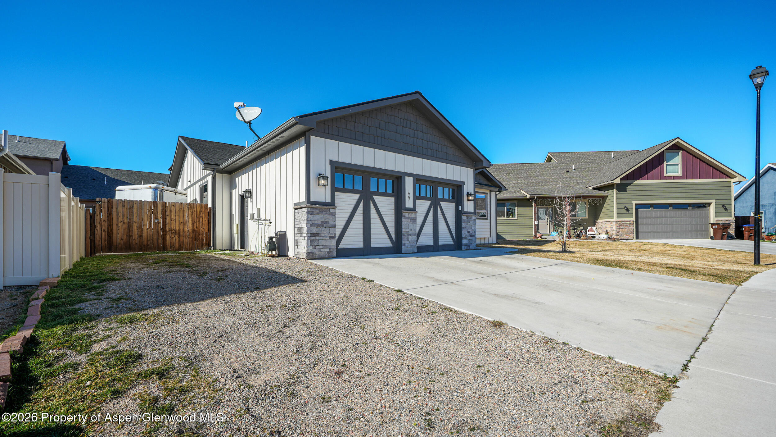 1667 Balsam Loop Rifle, CO 81650 - Photo 3 of 30 a front view of a house with a yard