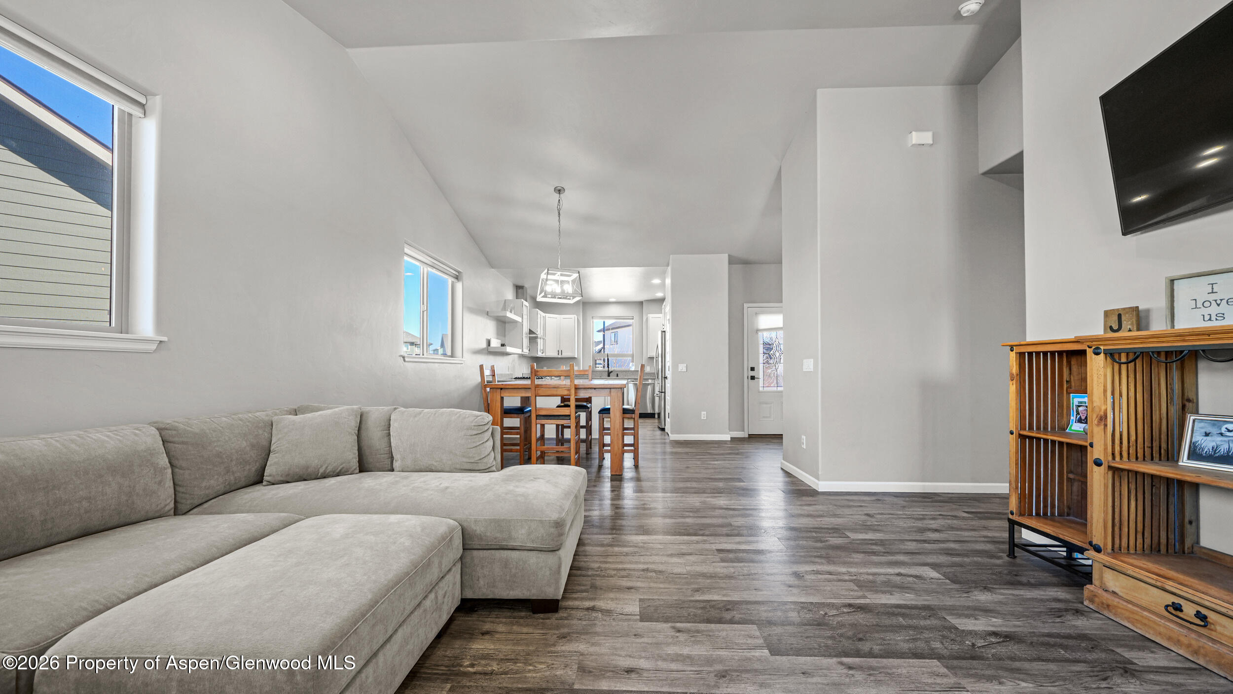 1667 Balsam Loop Rifle, CO 81650 - Photo 6 of 30 a living room with furniture and a flat screen tv
