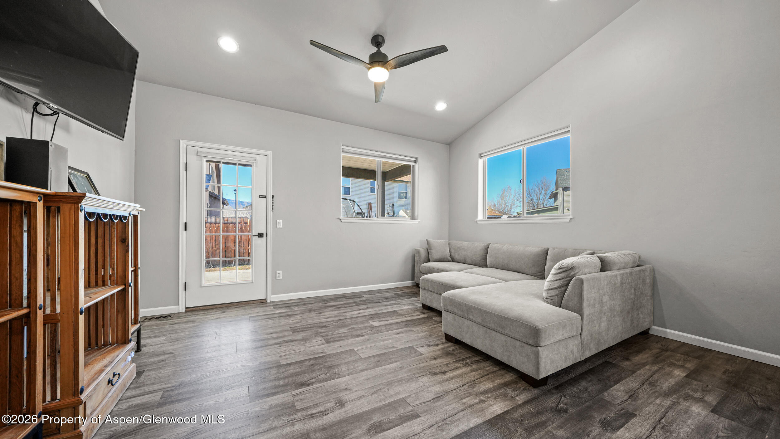 1667 Balsam Loop Rifle, CO 81650 - Photo 7 of 30 a living room with furniture and a flat screen tv