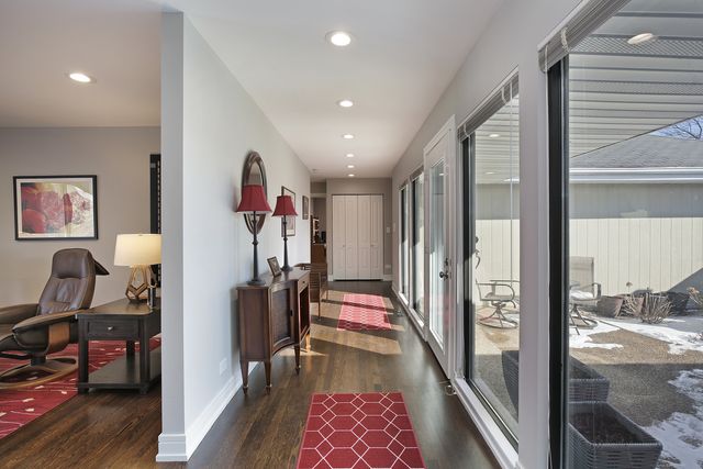 a view of entryway with wooden floor