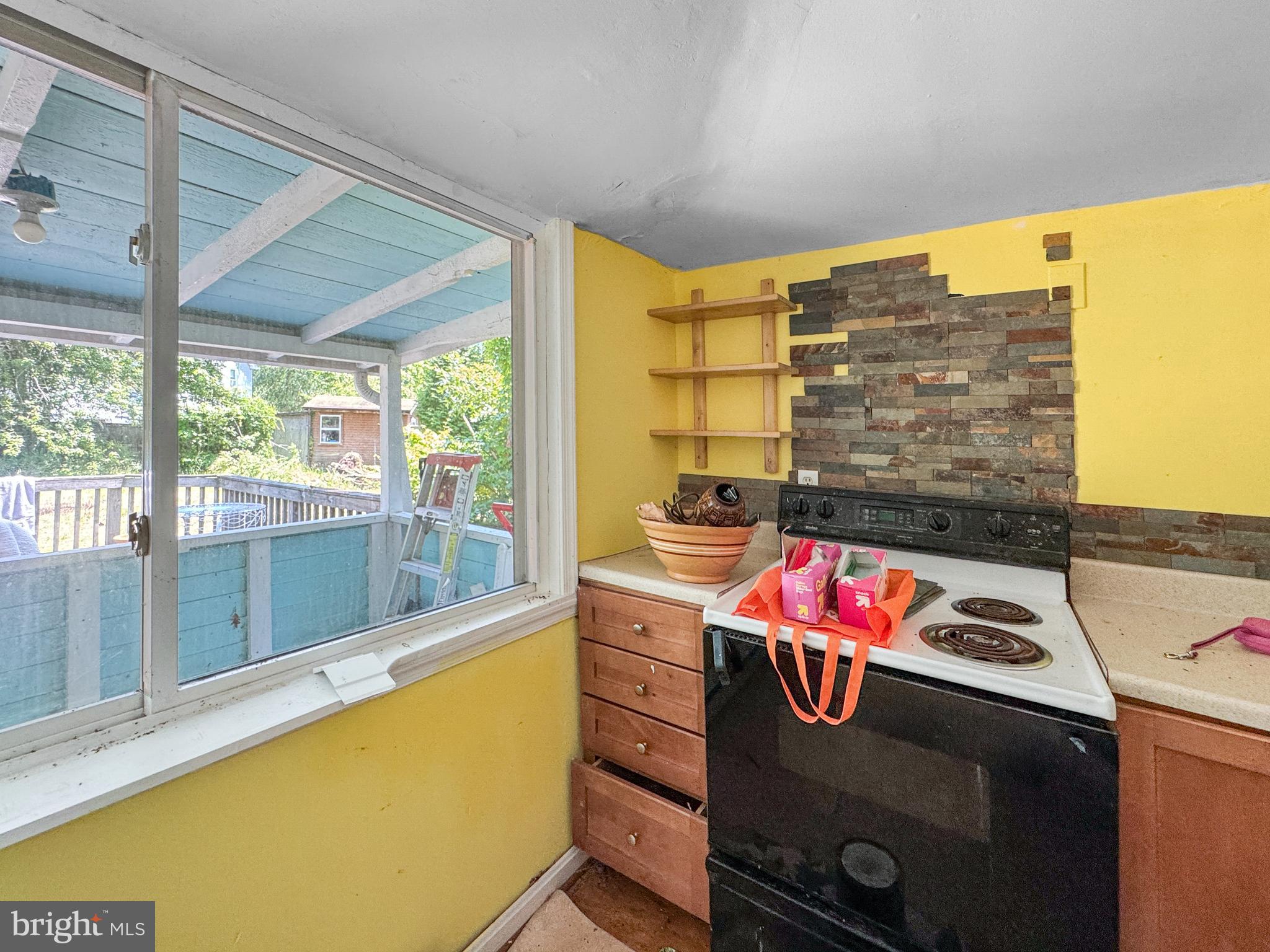 4725 Idlewilde Road Shady Side, MD 20764 - Photo 12 of 28 a living room with a large window