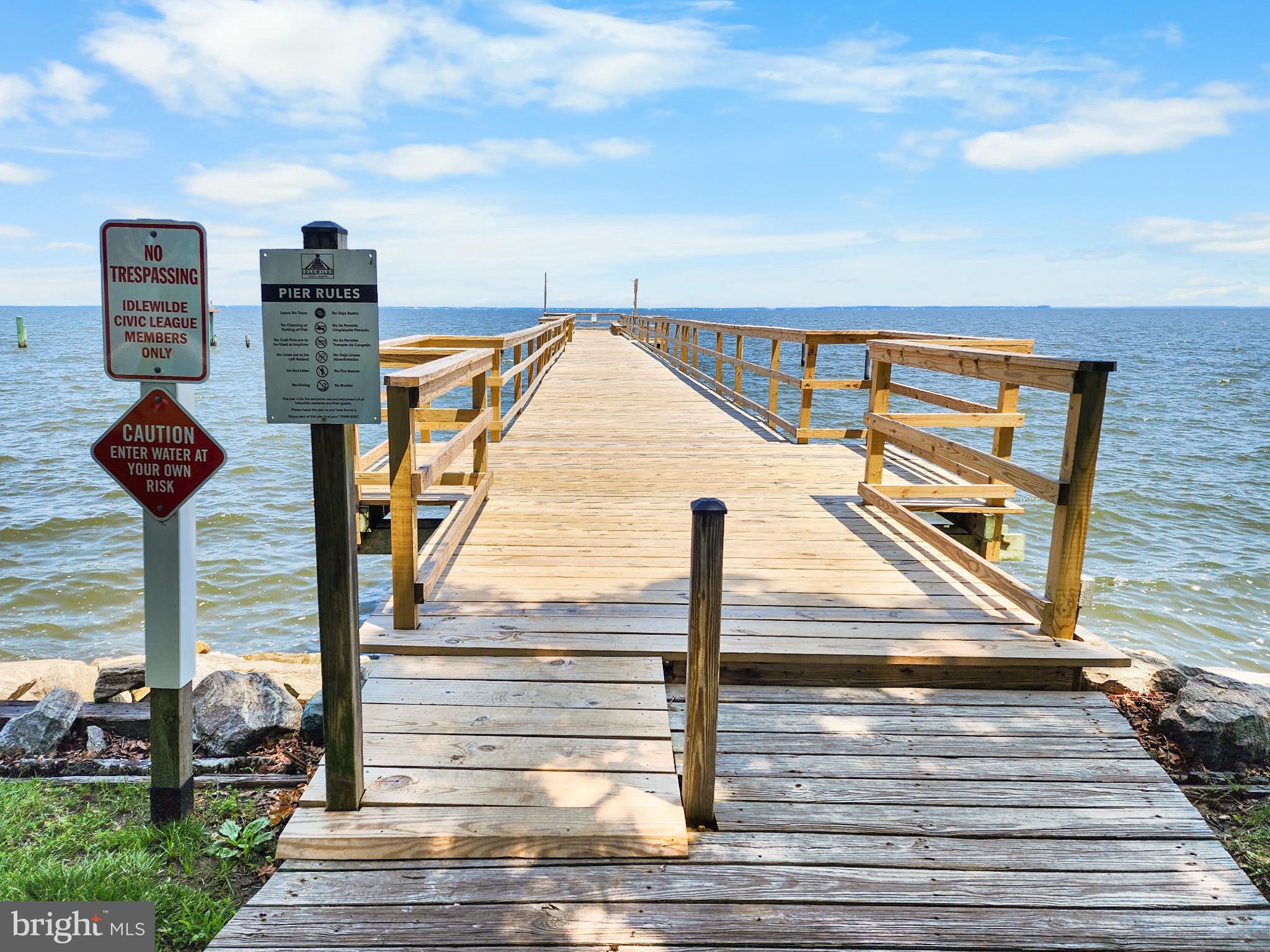 4725 Idlewilde Road Shady Side, MD 20764 - Photo 21 of 28 a view of a terrace with wooden floor and iron stairs