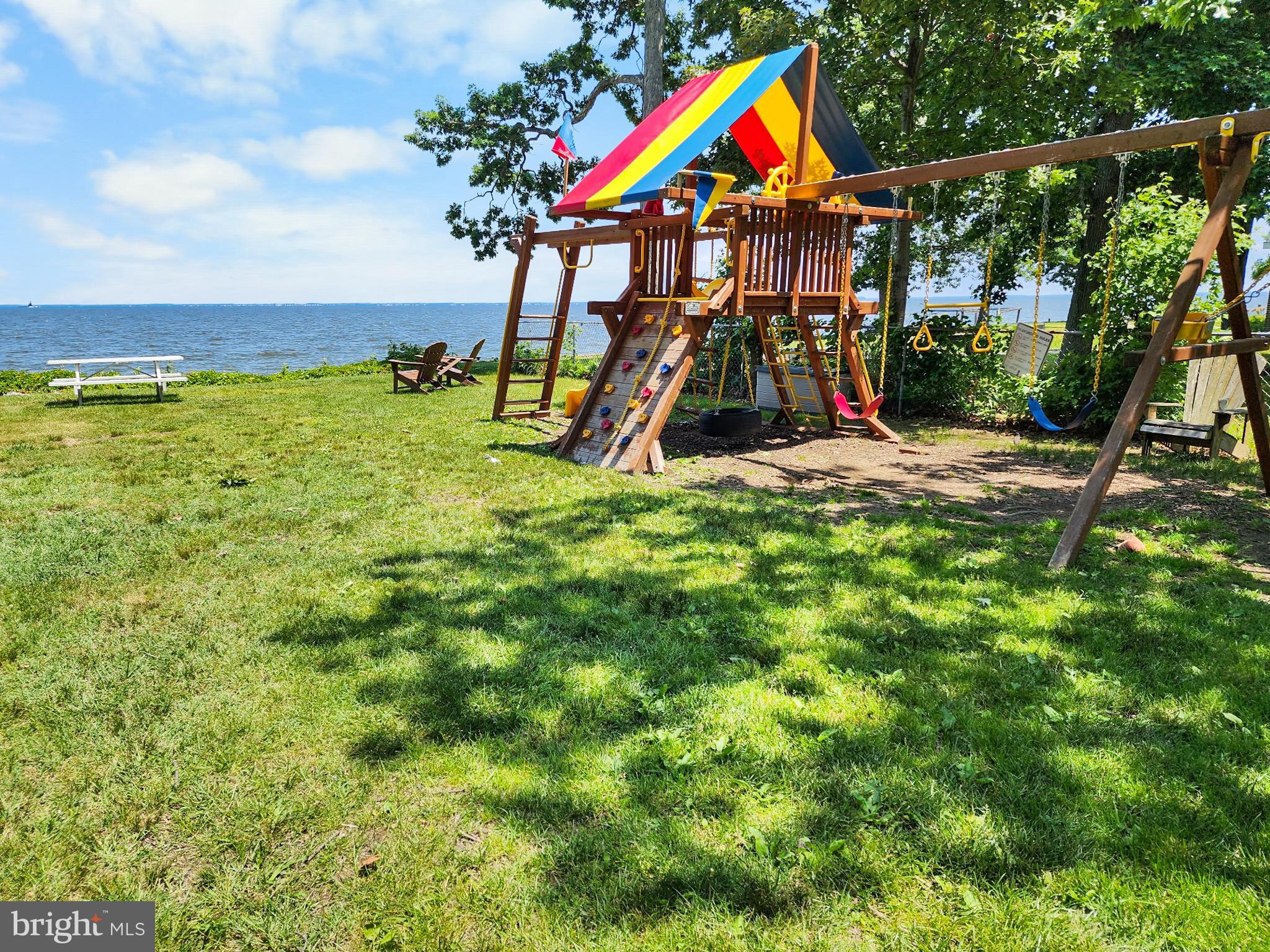 4725 Idlewilde Road Shady Side, MD 20764 - Photo 25 of 28 a view of outdoor space with a big yard and potted plants