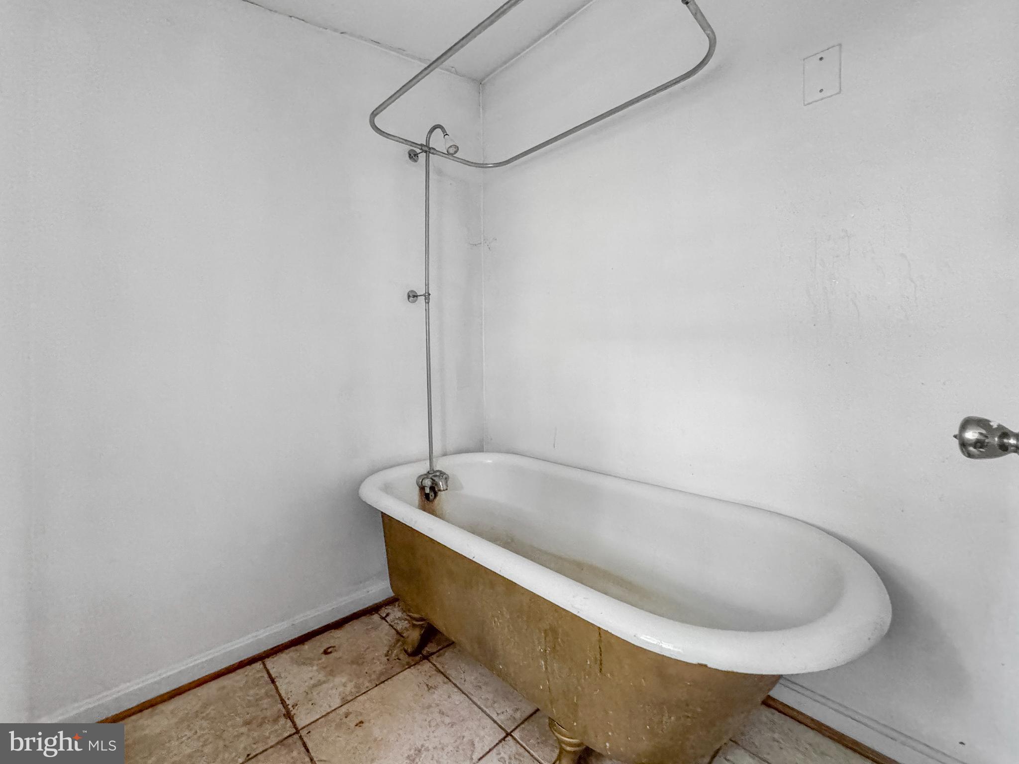 4725 Idlewilde Road Shady Side, MD 20764 - Photo 7 of 28 a bath tub sitting in a bathroom