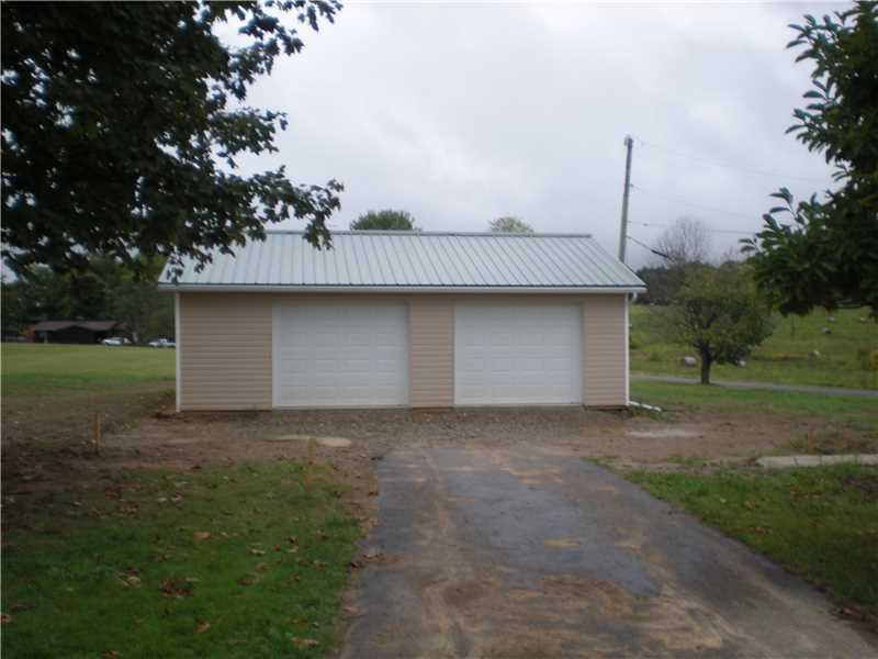 290 Crown Hill Road Prospect, PA 16052 - Photo 2 of 18 Parking Lot/Garage. New 2 car detached garage with auto door openers. Drive and parking area yet to be paved.