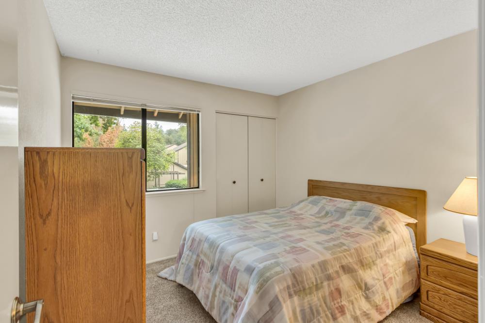 7025 Rancho Mirage Court Citrus Heights, CA 95621 - Photo 40 of 69 a bedroom with a bed and a window