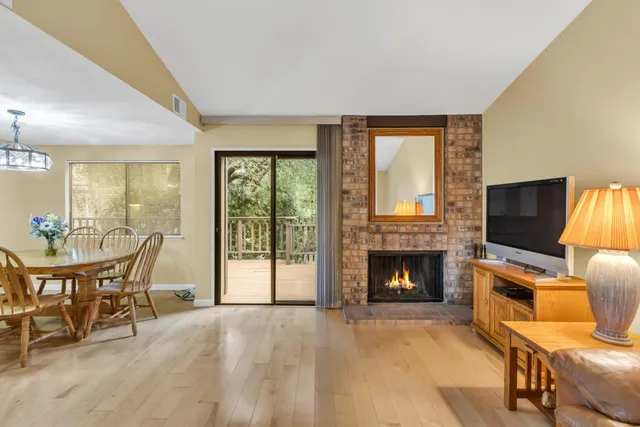 a view of a livingroom with furniture and a fireplace