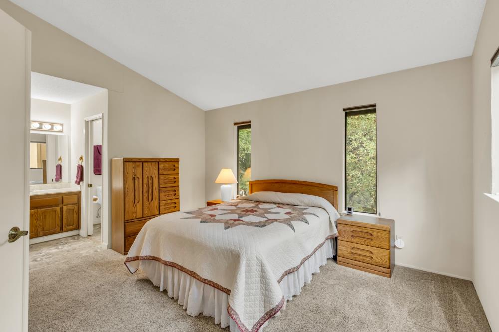 7025 Rancho Mirage Court Citrus Heights, CA 95621 - Photo 44 of 69 a bedroom with a bed and a dresser