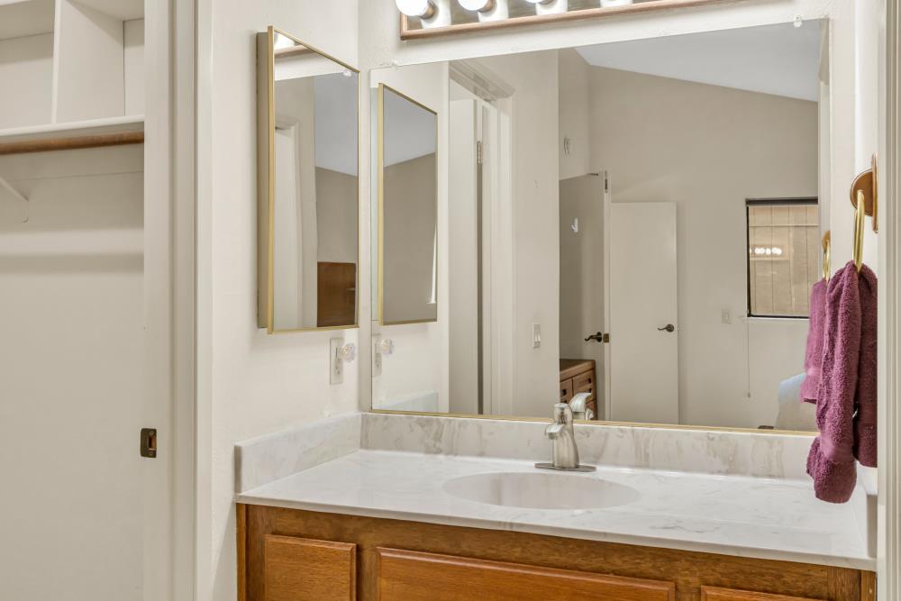7025 Rancho Mirage Court Citrus Heights, CA 95621 - Photo 47 of 69 a bathroom with a sink and a mirror