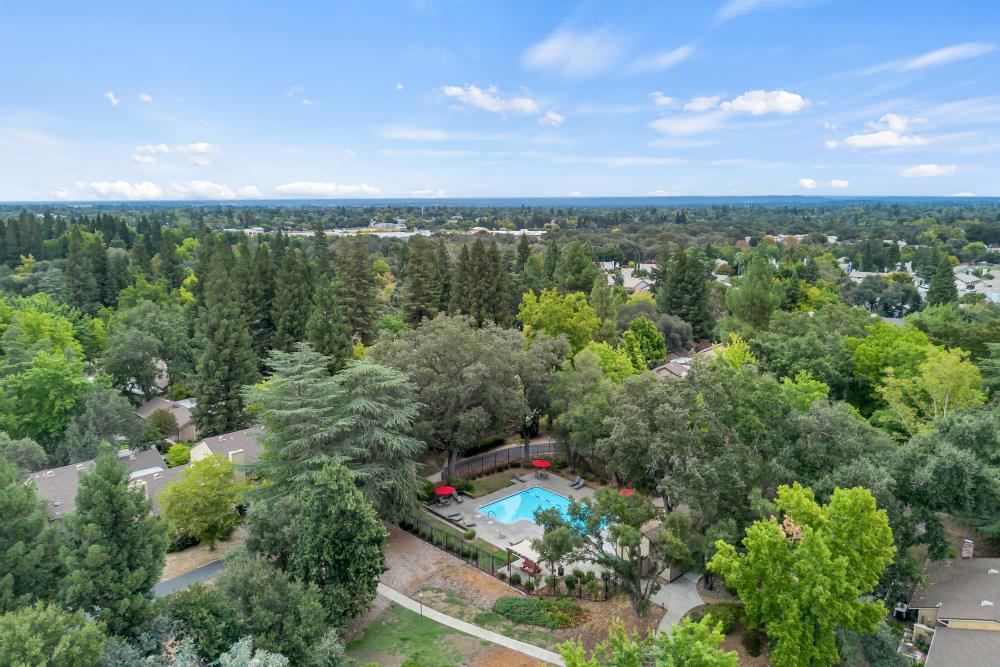 7025 Rancho Mirage Court Citrus Heights, CA 95621 - Photo 63 of 69 an aerial view of green landscape with trees houses and mountain view