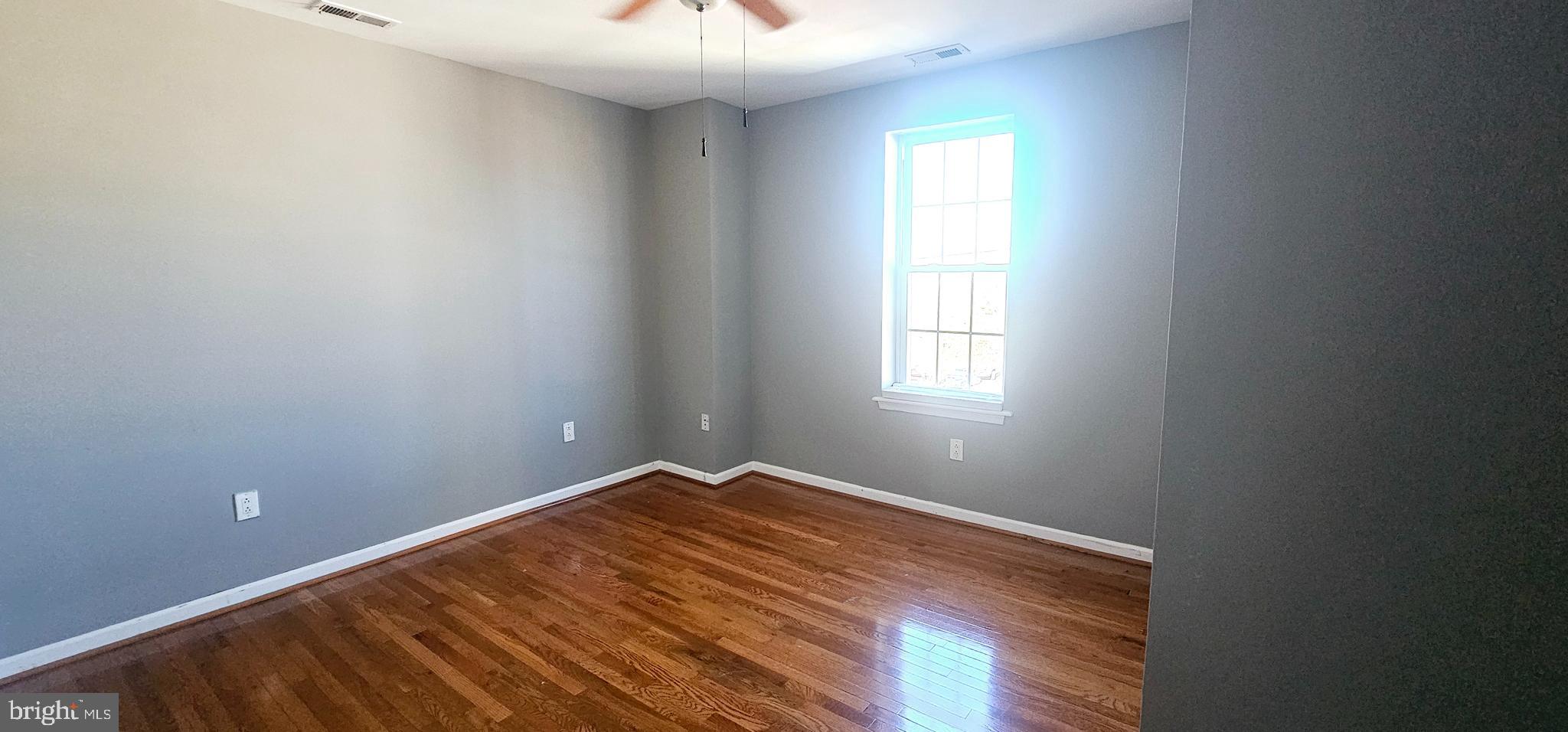362 West Ritner Street, Unit 3 Philadelphia, PA 19148 - Photo 11 of 13 a view of an empty room with a window
