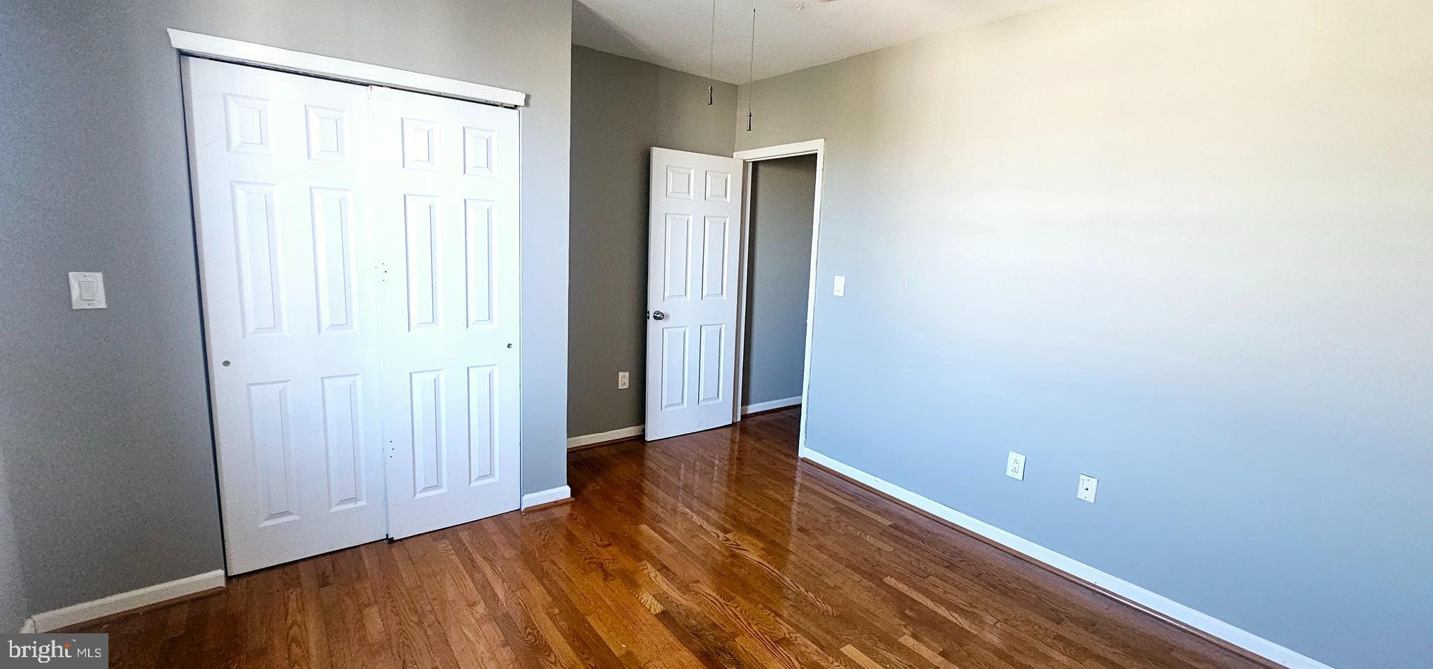 362 West Ritner Street, Unit 3 Philadelphia, PA 19148 - Photo 13 of 13 a view of an empty room with closet and a window