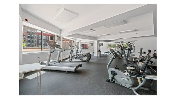 a view of a room with gym equipment