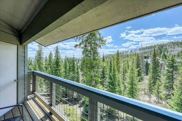 a view of a balcony with an outdoor space