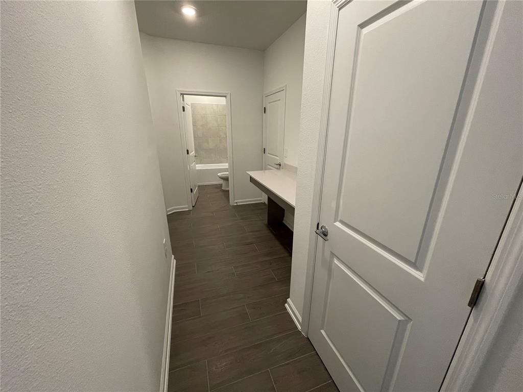 2623 Runners Circle Clermont, FL 34714 - Photo 11 of 21 a bathroom with a sink and toilet