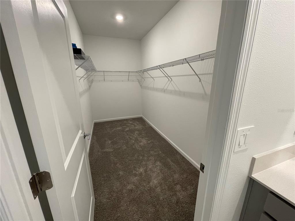 2623 Runners Circle Clermont, FL 34714 - Photo 15 of 21 wooden floor in an empty room